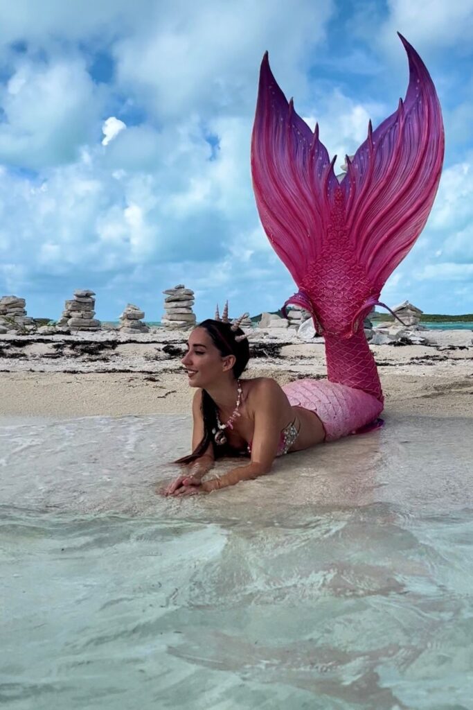 Bahamas Boat tour destination: Mermaid Jules relaxes on a sandbar