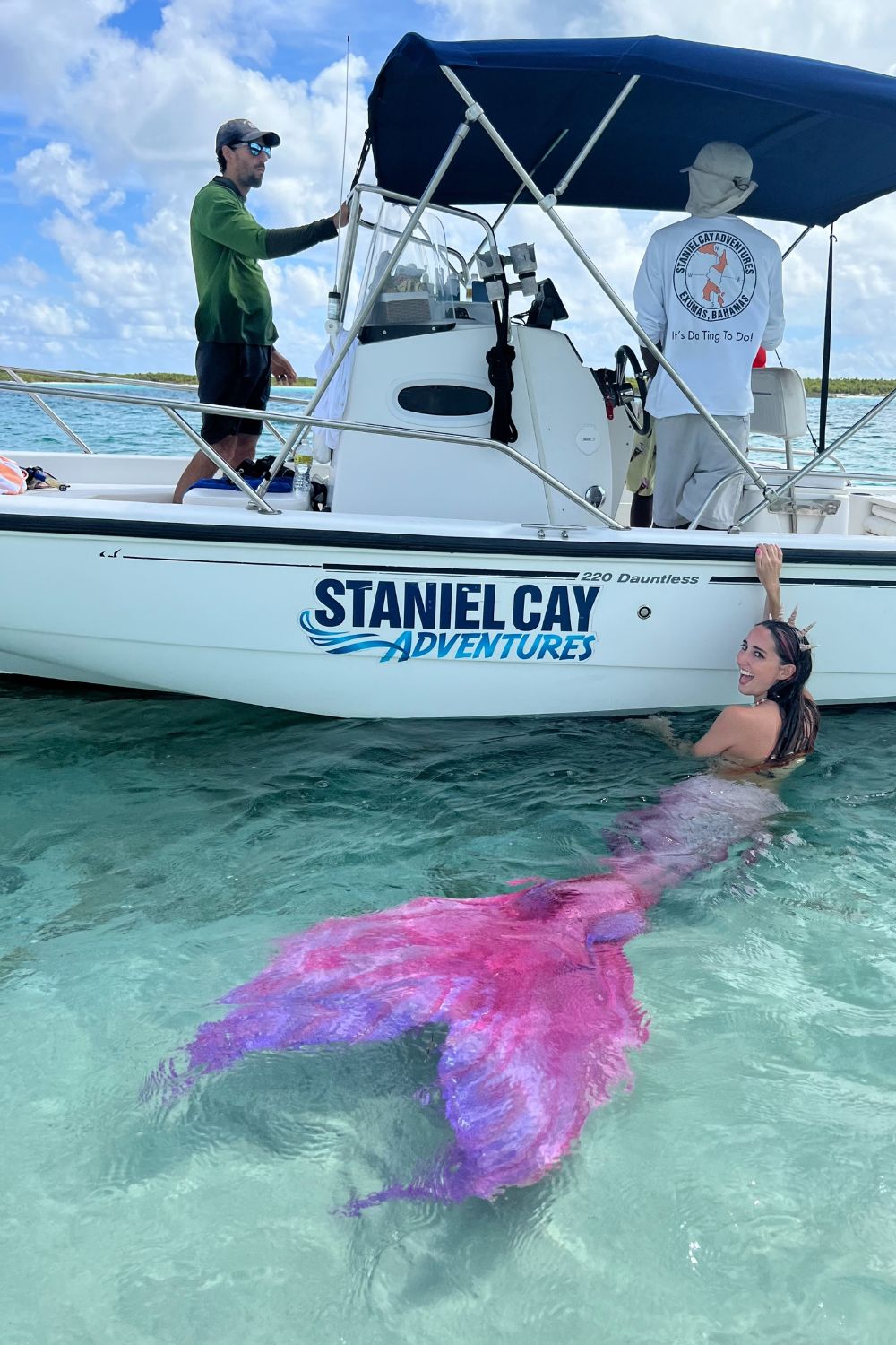 Mermaid Jules climbs aboard Staniel Cay Adventures Bahamas Boat tour