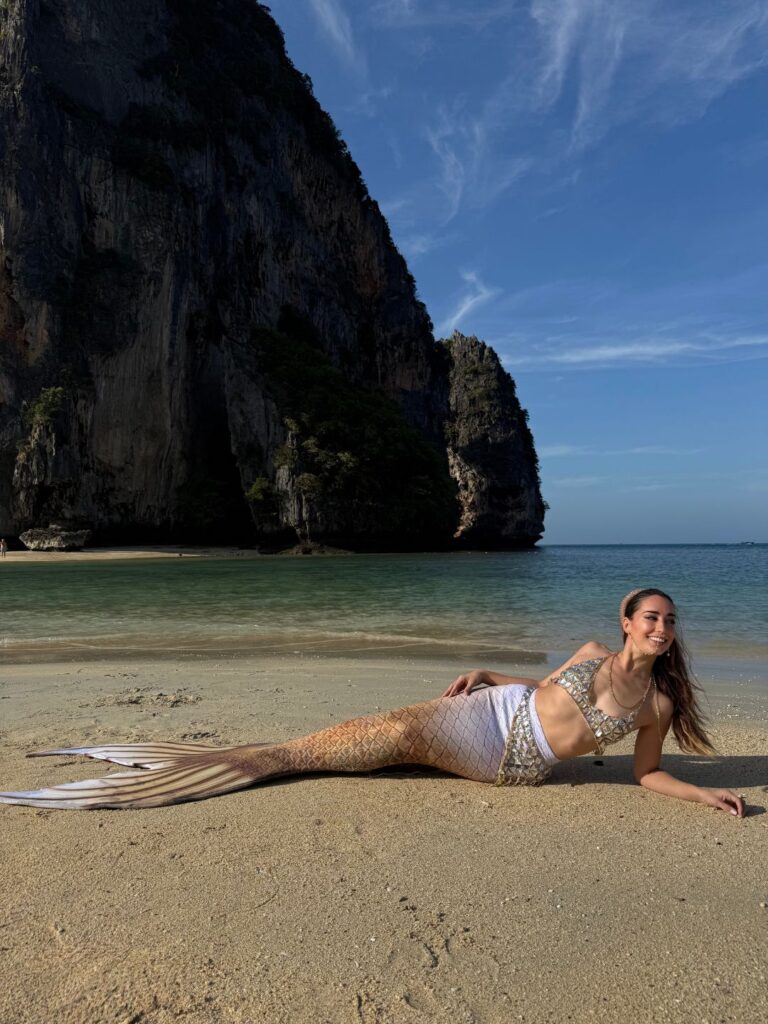 Mermaid Jules on the beaches in Thailand, wearing Finfolk Productions "olympia" mermaid tail